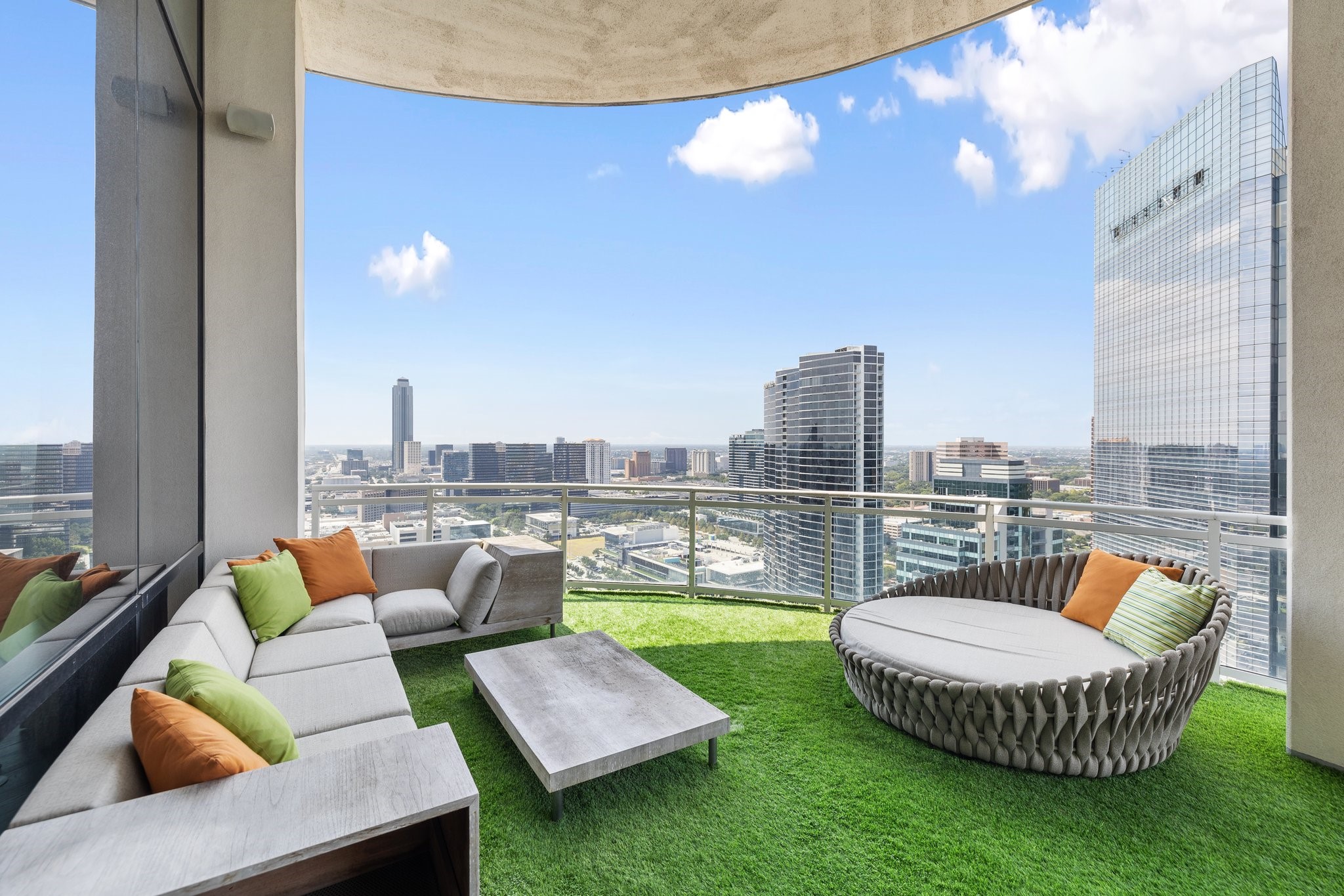 1409 Post Oak Boulevard, Unit 2702 Houston, TX 77056 - Photo 5 of 43 The turfed balcony with incredible panoramic views is the perfect outdoor entertaining space.