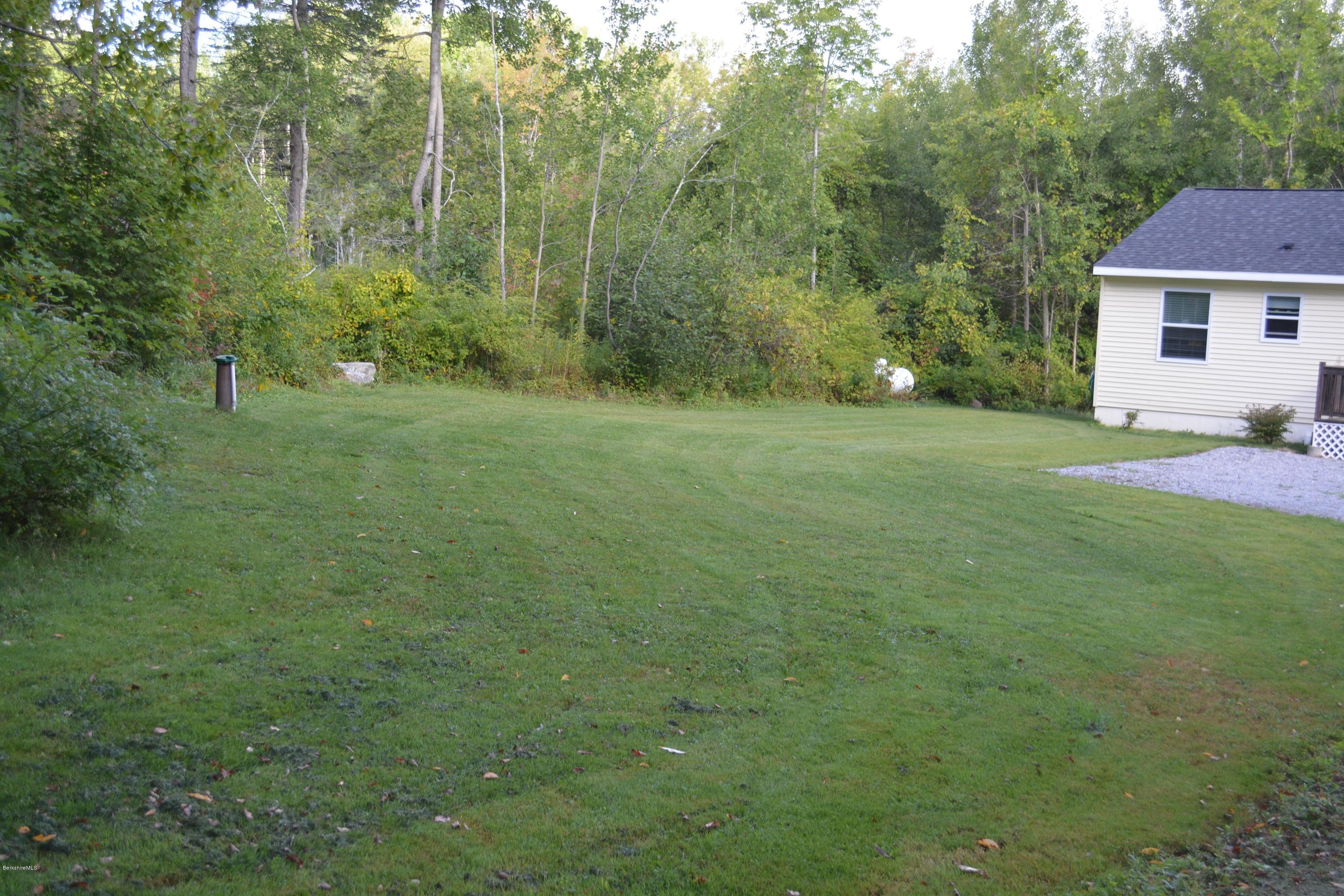 220 Sandisfield Road Sandisfield, MA 01255 - Photo 23 of 30 a view of a backyard of the house