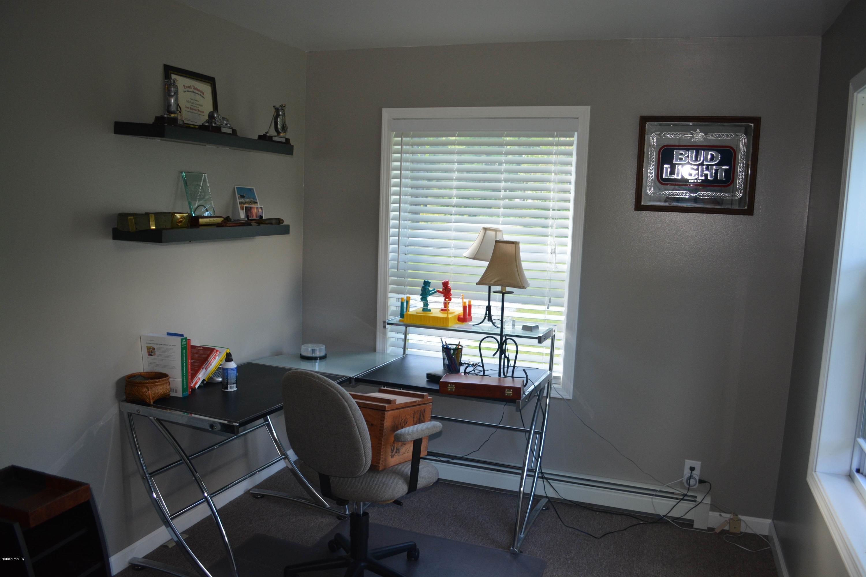 220 Sandisfield Road Sandisfield, MA 01255 - Photo 6 of 30 a work room with furniture and a window