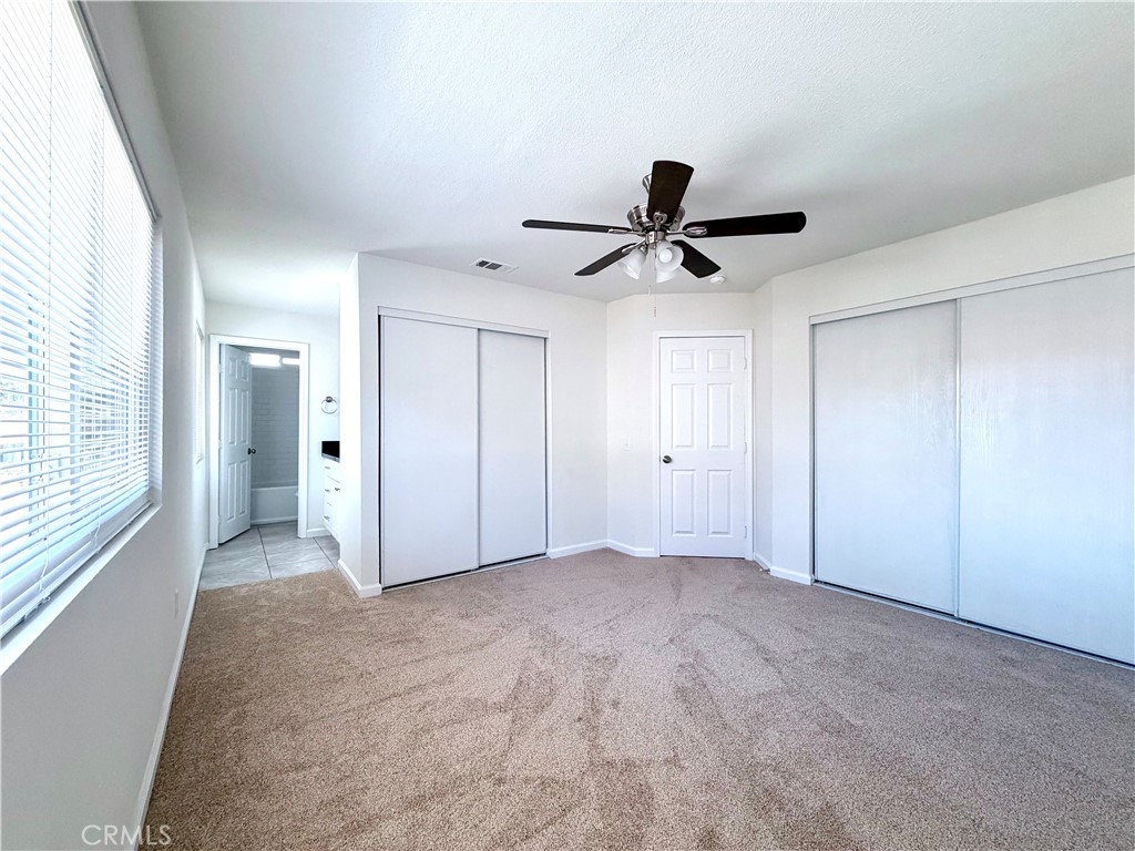 417 North Grove Avenue, Unit A Ontario, CA 91764 - Photo 13 of 17 a view of an empty room and a ceiling fan