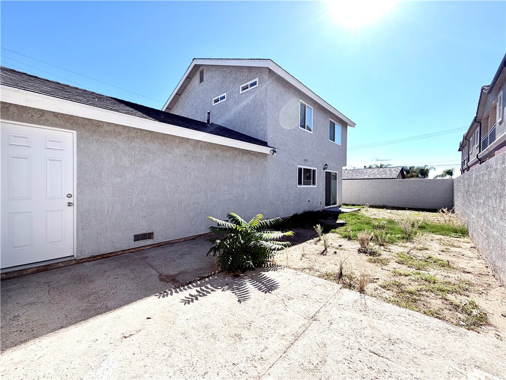 417 North Grove Avenue, Unit A Ontario, CA 91764 - Photo 14 of 17 a view of potted plant in front of a house