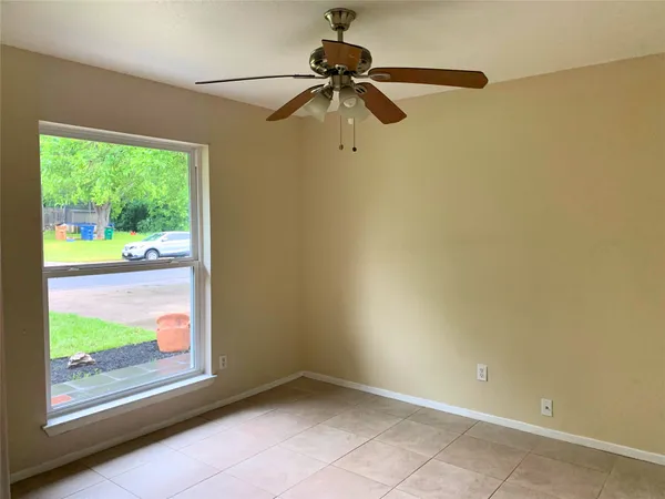 a view of backyard with tree