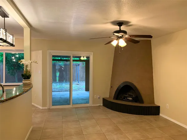 a kitchen with a sink a stove and cabinets