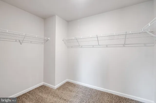 a view of a room with racks on the wall