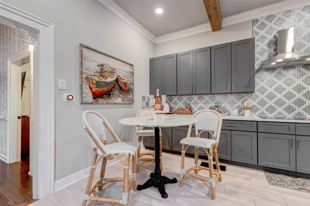 a kitchen with a sink cabinets and appliances