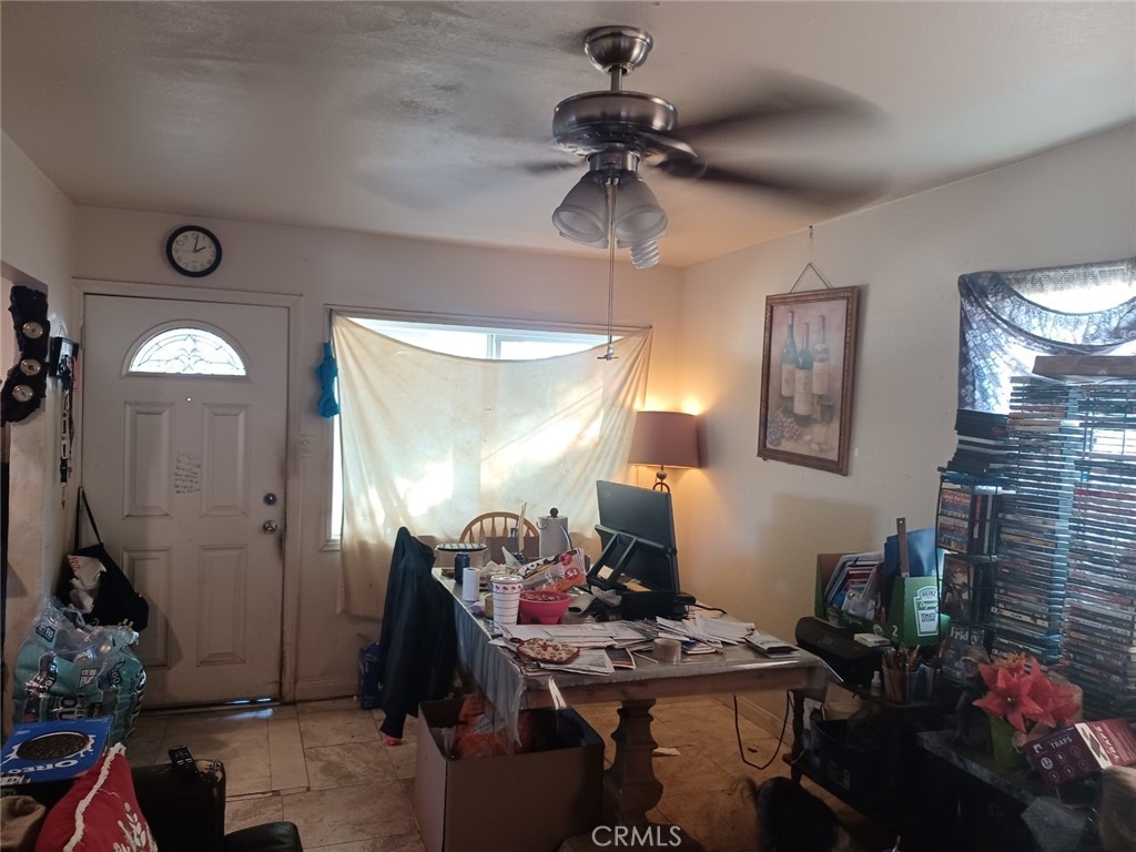 25508 Paloma Road Highland, CA 92410 - Photo 11 of 17 a room with furniture and window