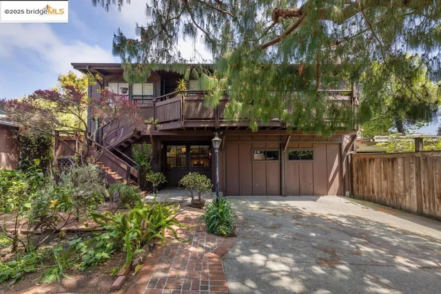 a view of a backyard with sitting area