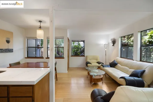 a kitchen with a table and chairs in it