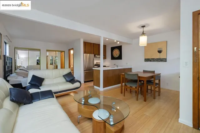 a view of a chair and table on the patio