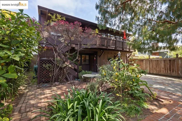 a picture of a bathroom with a refrigerator