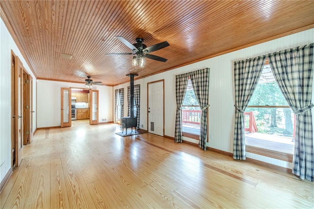 317 Duncan Road Oxford, GA 30054 - Photo 17 of 48 a view of a livingroom with wooden floor and door
