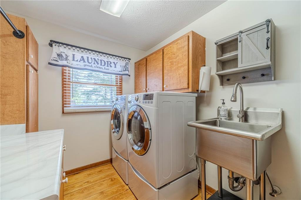 317 Duncan Road Oxford, GA 30054 - Photo 20 of 48 a utility room with dryer and washer