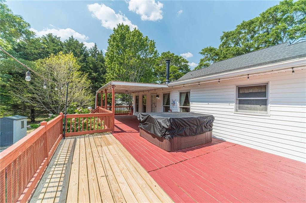 317 Duncan Road Oxford, GA 30054 - Photo 33 of 48 a balcony with wooden floor and fence