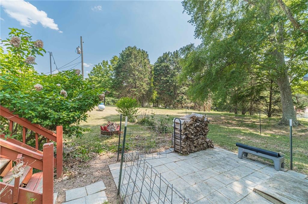 317 Duncan Road Oxford, GA 30054 - Photo 36 of 48 a view of a yard with an outdoor space