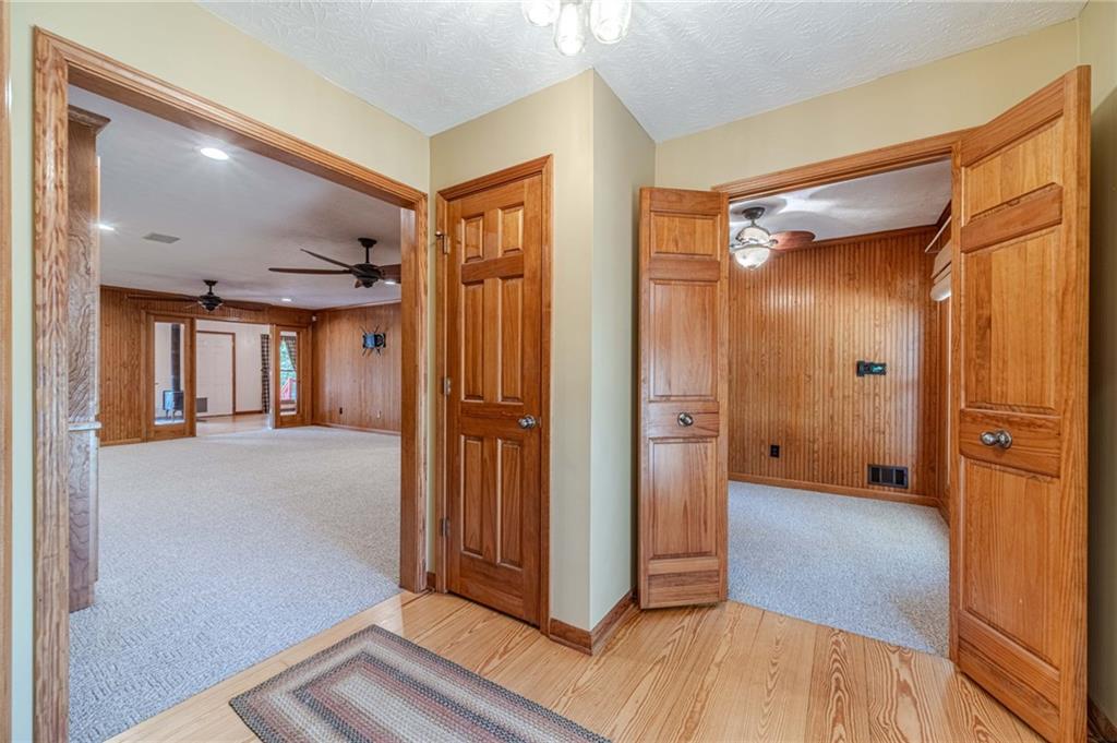 317 Duncan Road Oxford, GA 30054 - Photo 4 of 48 a view of hallway with wooden floor