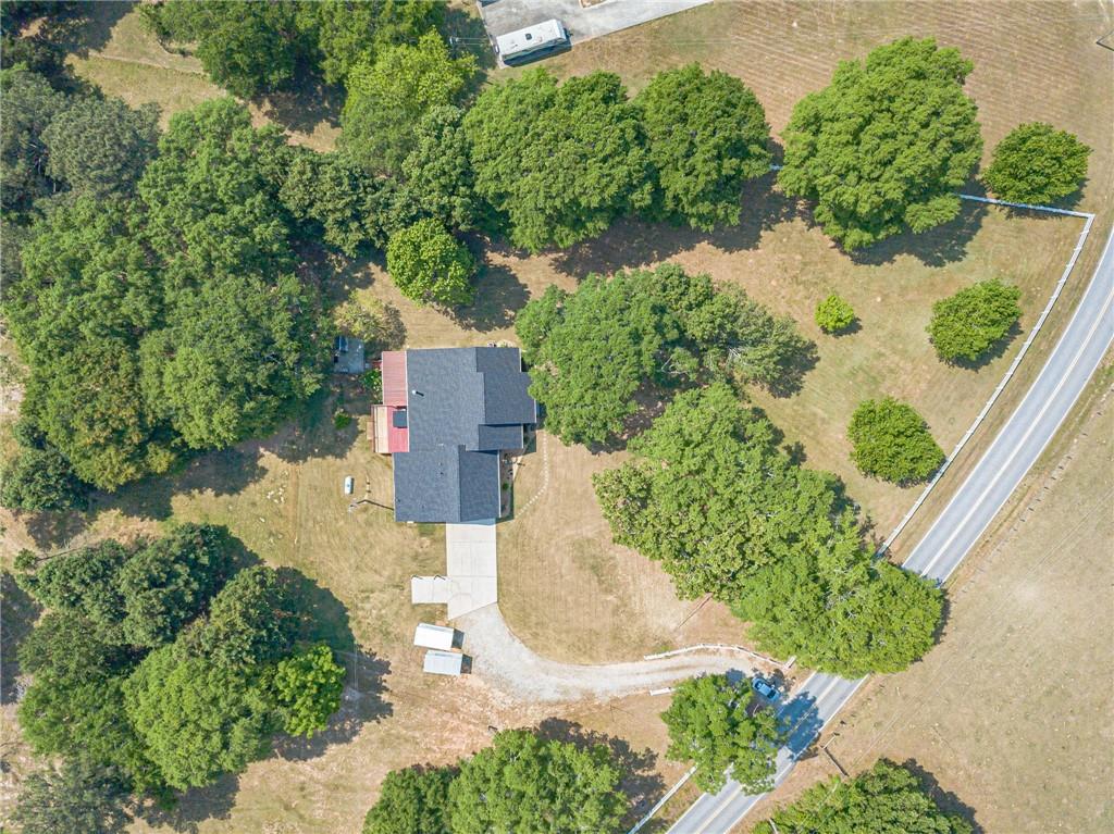 317 Duncan Road Oxford, GA 30054 - Photo 45 of 48 an aerial view of a house with a yard and lake