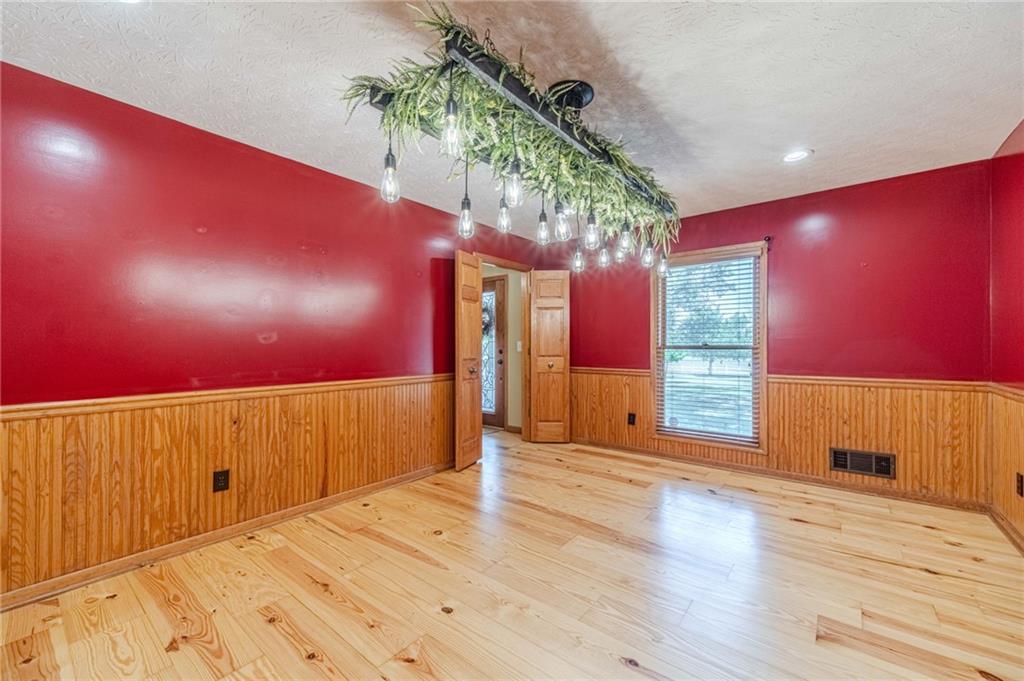 317 Duncan Road Oxford, GA 30054 - Photo 8 of 48 a view of a livingroom with wooden floor
