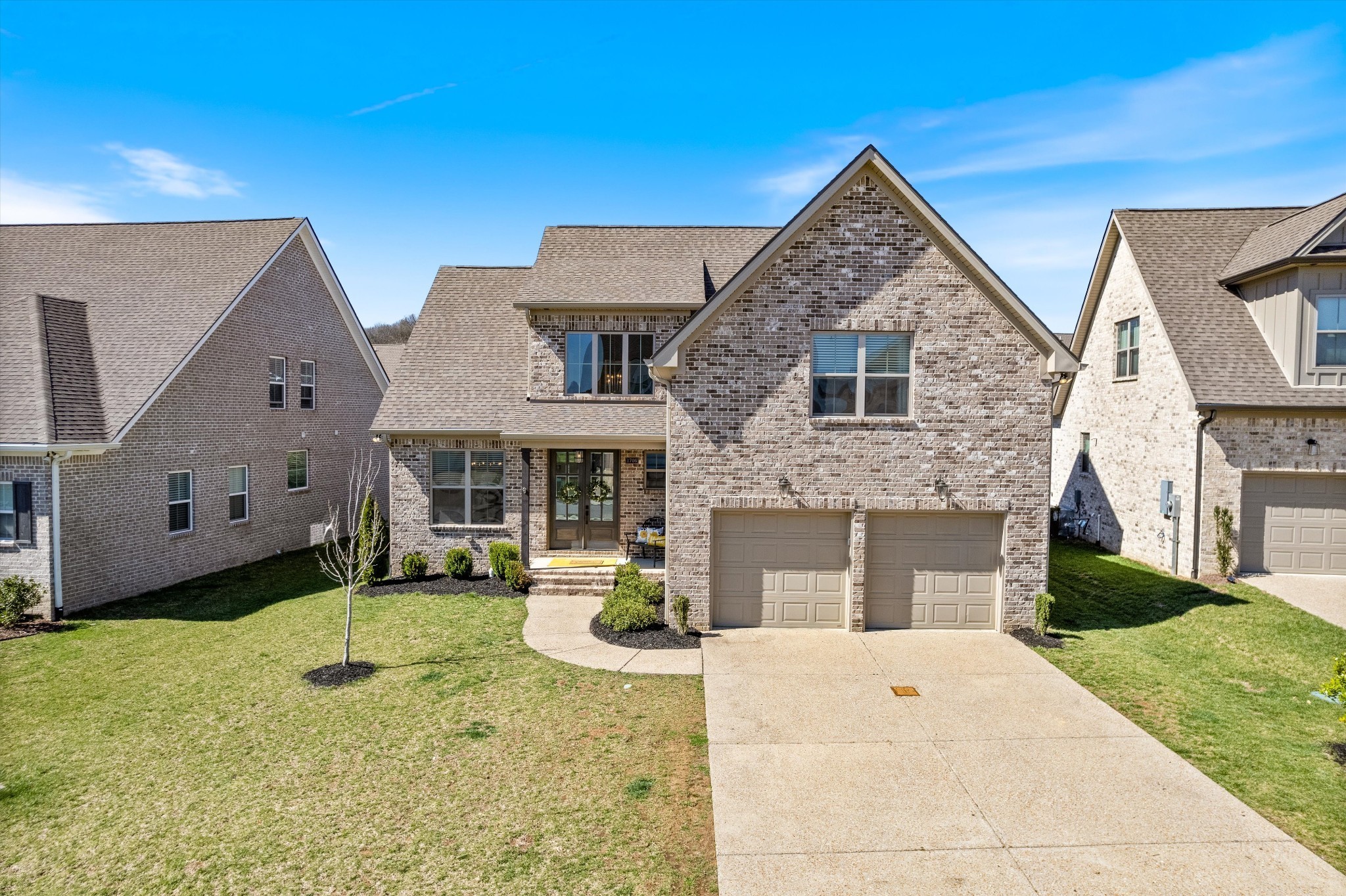 1706 Sorrell Pk Drive Spring Hill, TN 37174 - Photo 1 of 50 a front view of a house with a yard