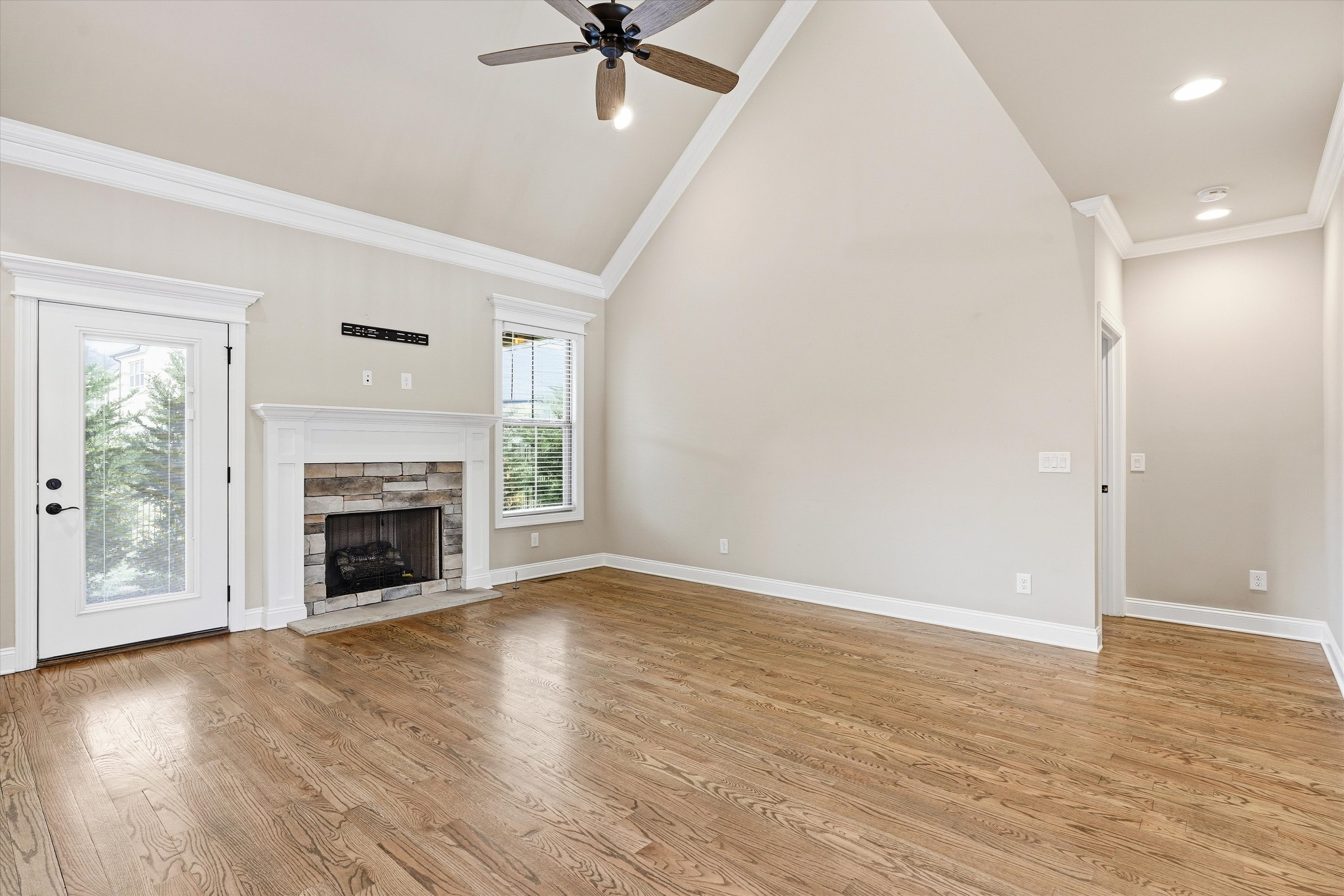 1706 Sorrell Pk Drive Spring Hill, TN 37174 - Photo 11 of 50 wooden floor fireplace and windows in an empty room