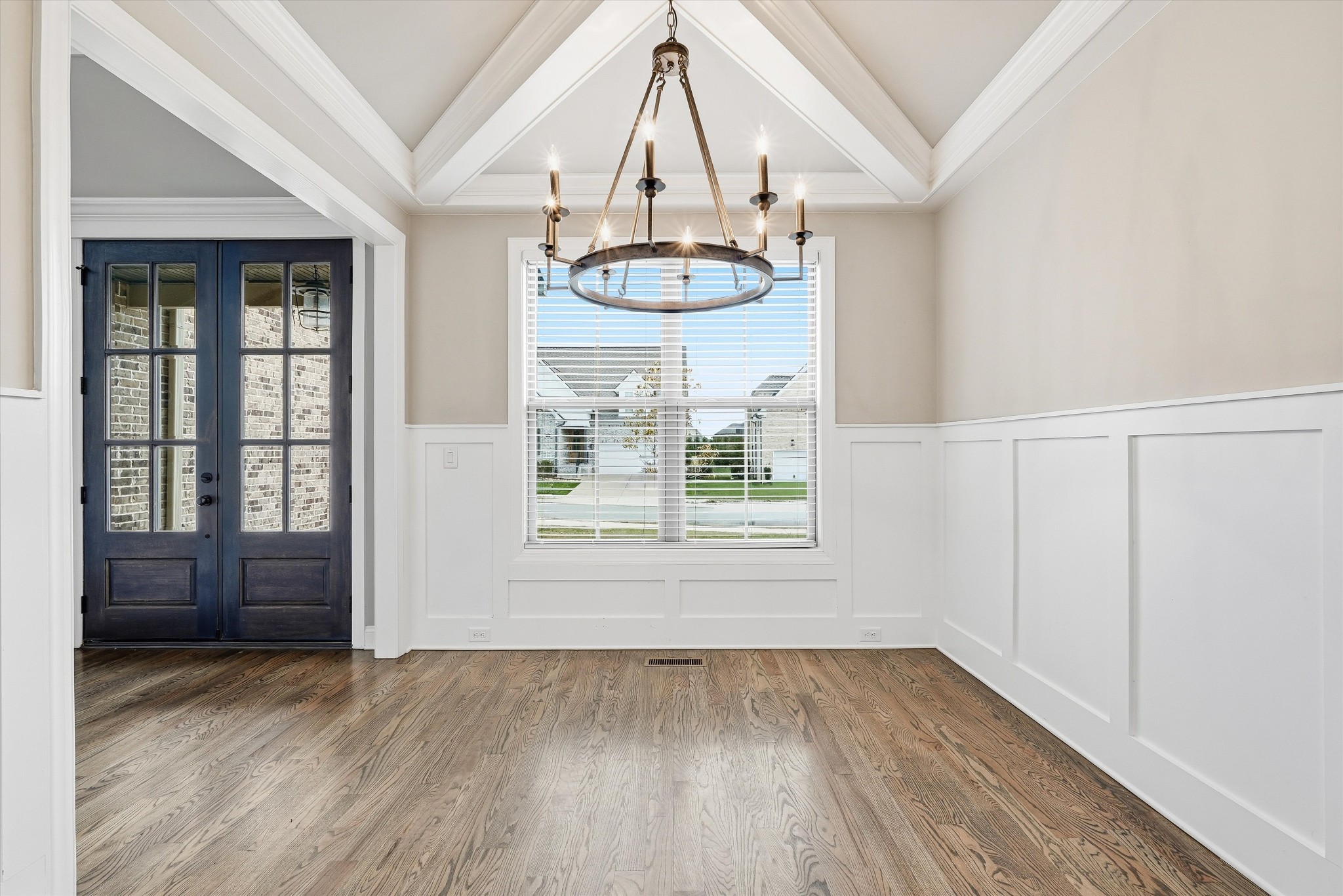 1706 Sorrell Pk Drive Spring Hill, TN 37174 - Photo 15 of 50 a view of an empty room with wooden floor and a window