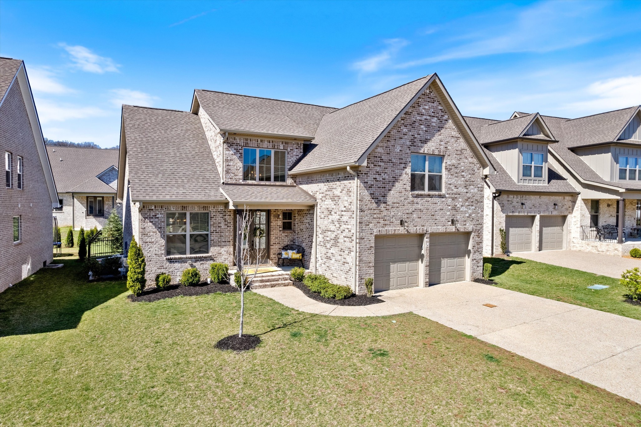 1706 Sorrell Pk Drive Spring Hill, TN 37174 - Photo 2 of 50 a front view of a house with a yard