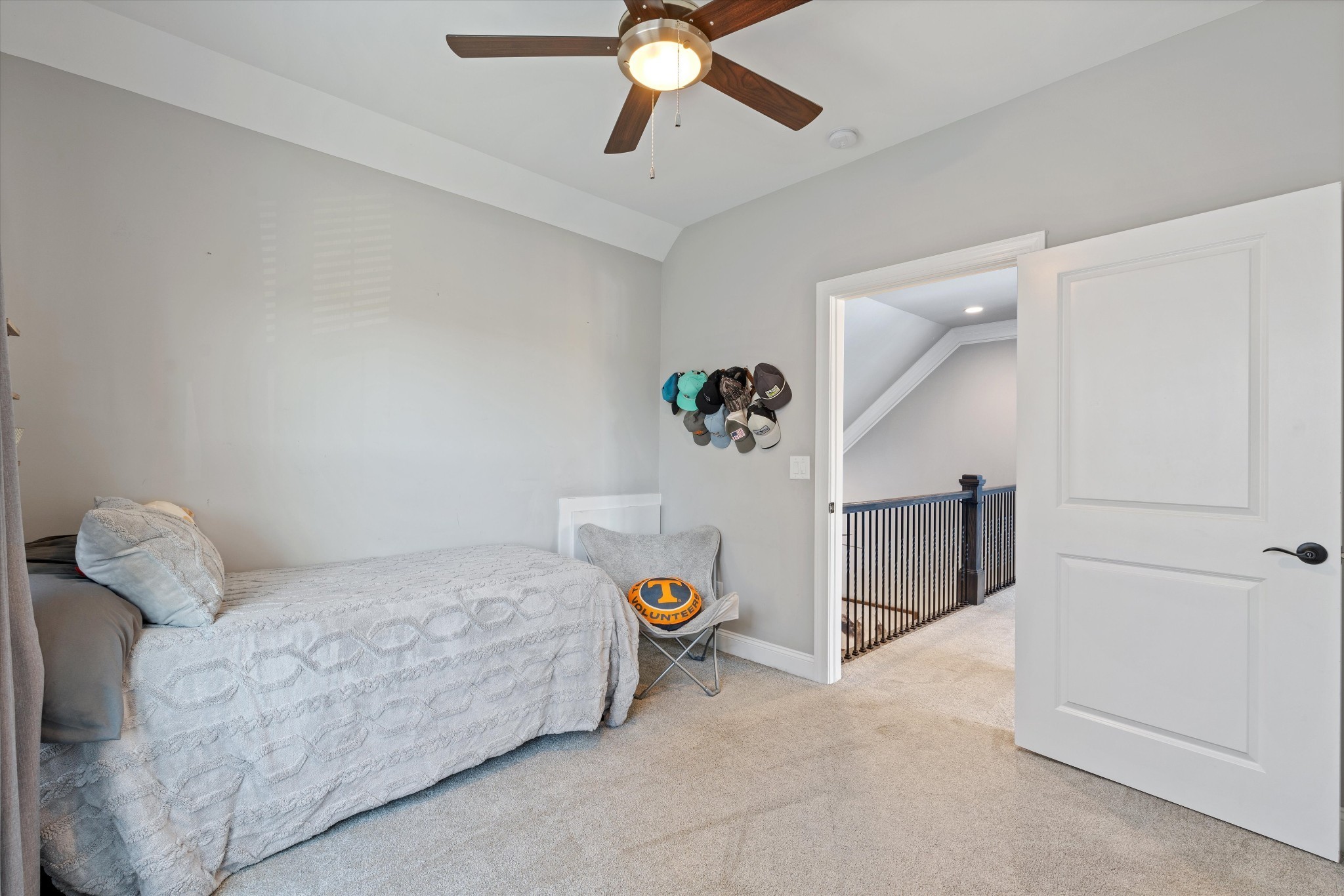 1706 Sorrell Pk Drive Spring Hill, TN 37174 - Photo 29 of 50 a bedroom with a bed and a chandelier