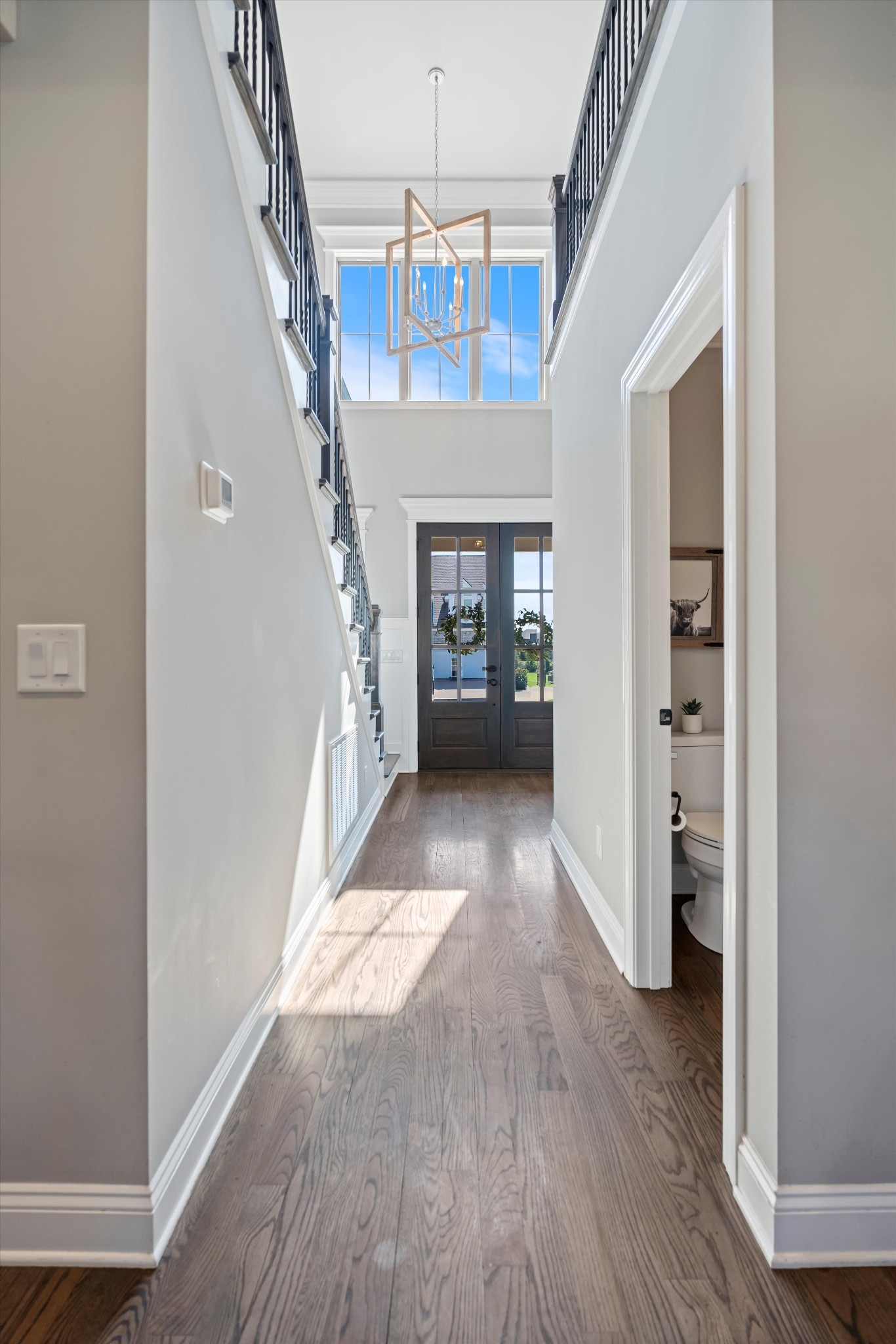 1706 Sorrell Pk Drive Spring Hill, TN 37174 - Photo 3 of 50 a view of gallery with wooden floor and a chandelier