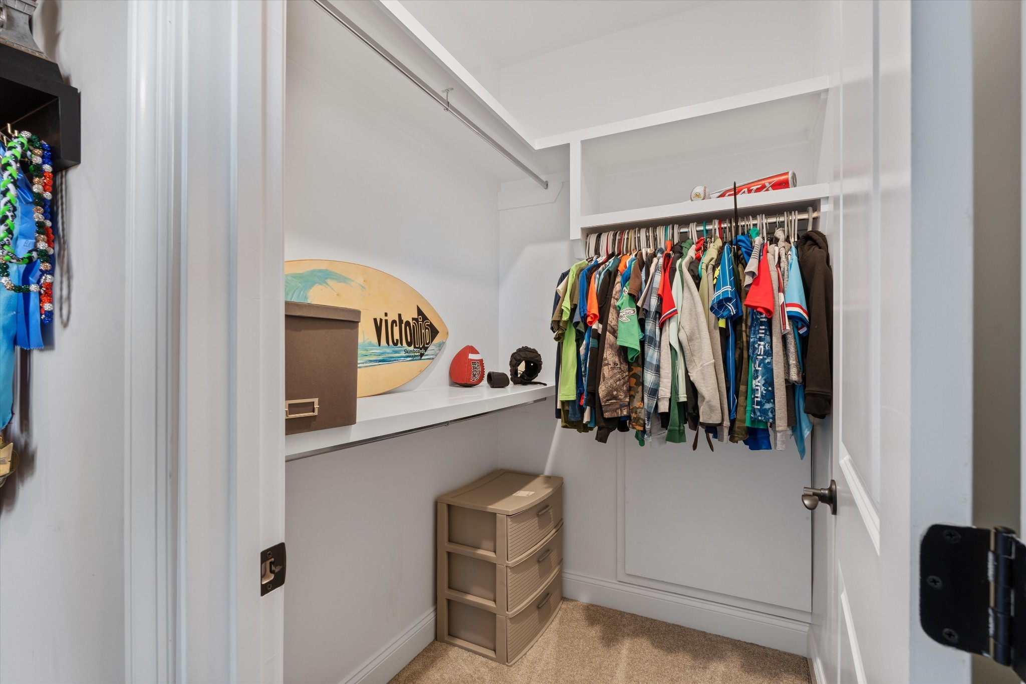 1706 Sorrell Pk Drive Spring Hill, TN 37174 - Photo 32 of 50 a view of walk in closet with clothes and shoes