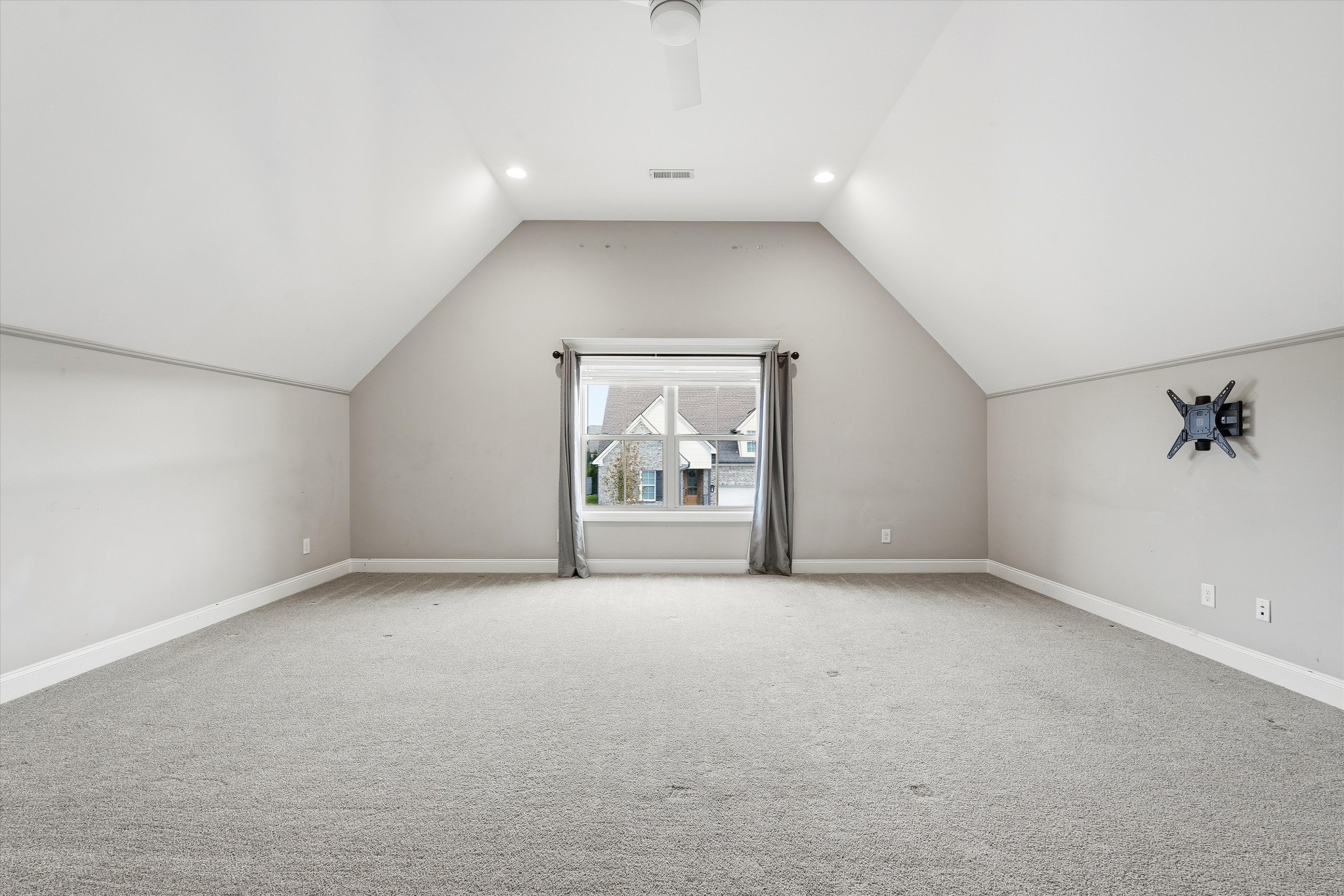 1706 Sorrell Pk Drive Spring Hill, TN 37174 - Photo 36 of 50 an empty room with a window and a potted plant