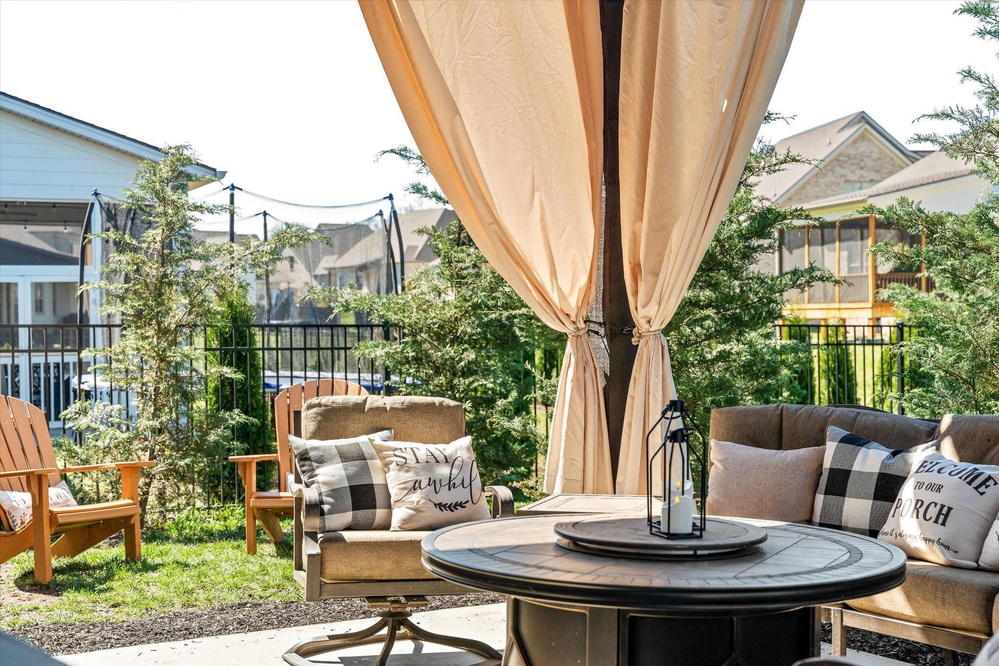1706 Sorrell Pk Drive Spring Hill, TN 37174 - Photo 39 of 50 a view of a patio with table and chairs and potted plants