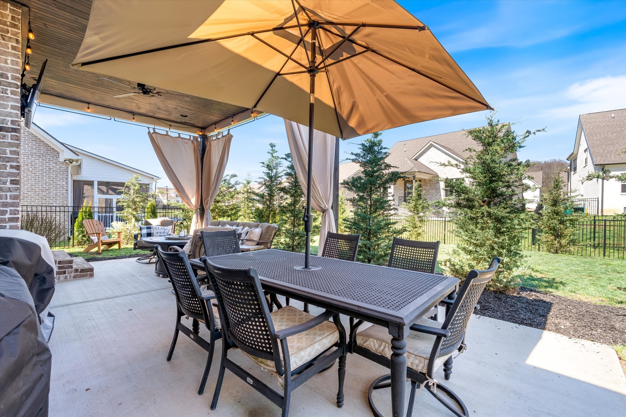 1706 Sorrell Pk Drive Spring Hill, TN 37174 - Photo 40 of 50 a view of an outdoor space with furniture and umbrella