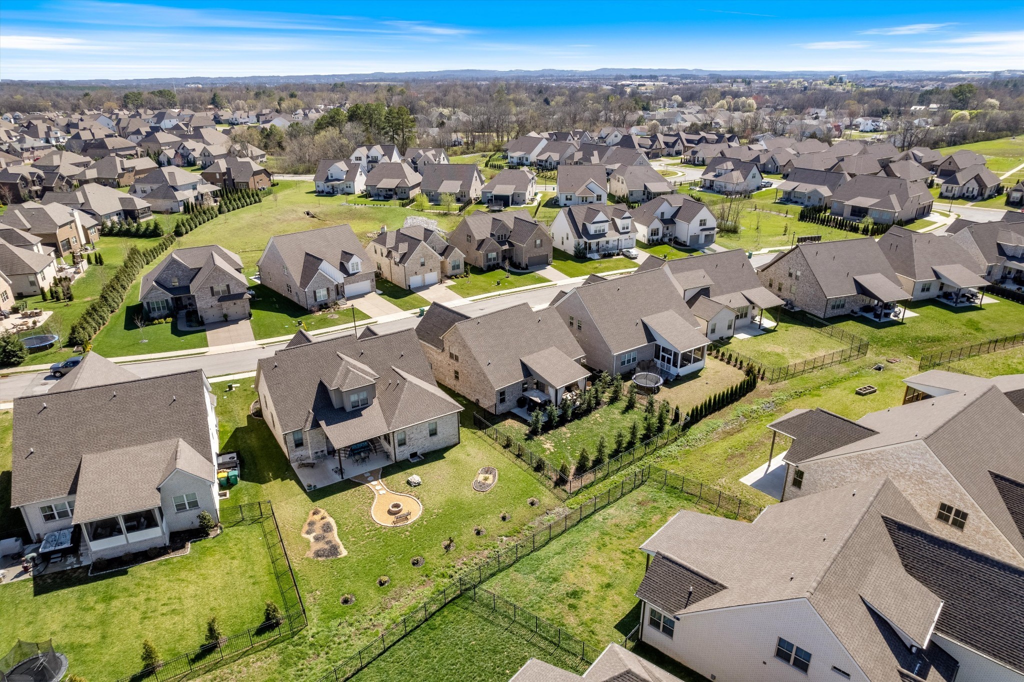 1706 Sorrell Pk Drive Spring Hill, TN 37174 - Photo 46 of 50 an aerial view of a house with a swimming pool
