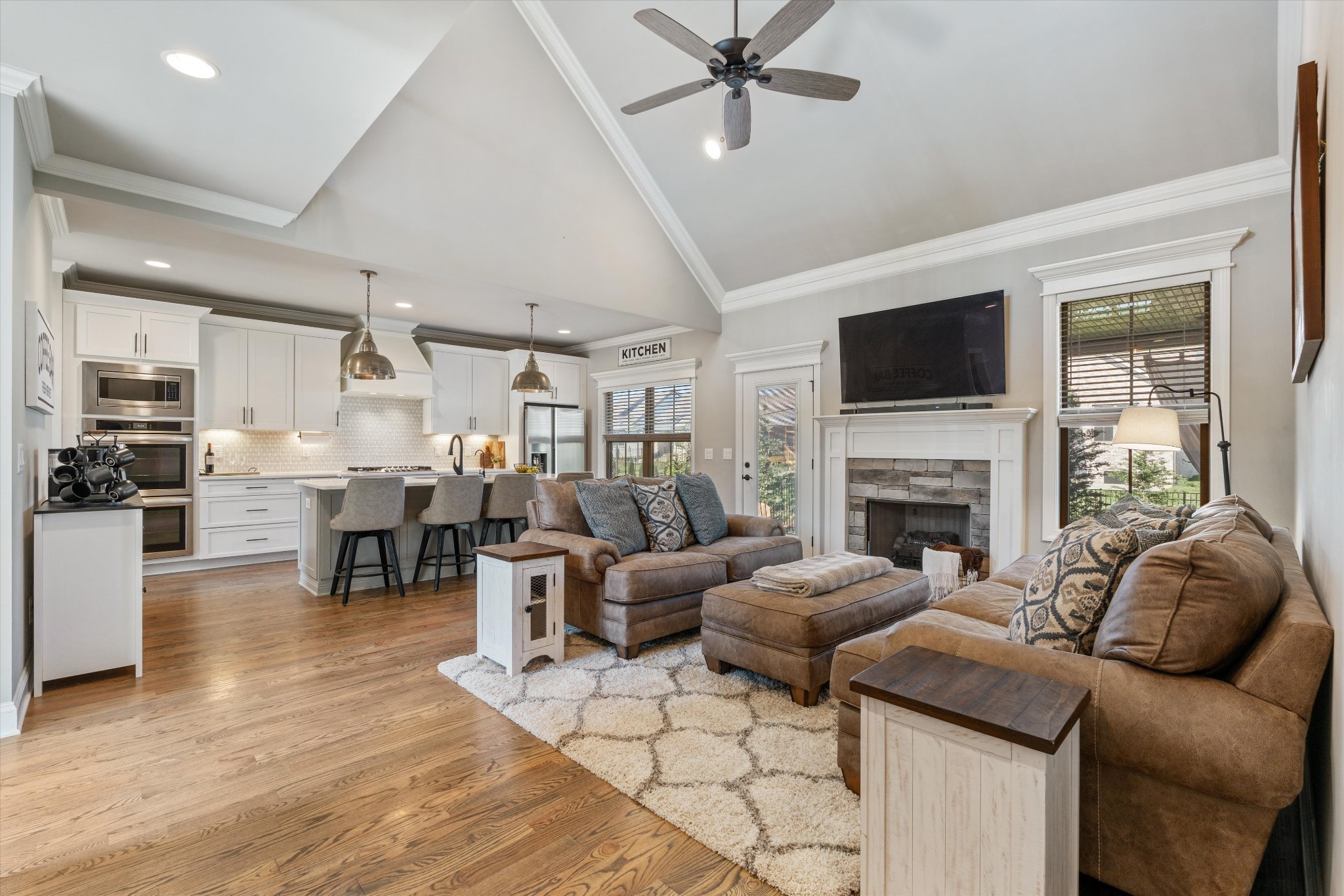 1706 Sorrell Pk Drive Spring Hill, TN 37174 - Photo 9 of 50 a living room with furniture fireplace and a flat screen tv