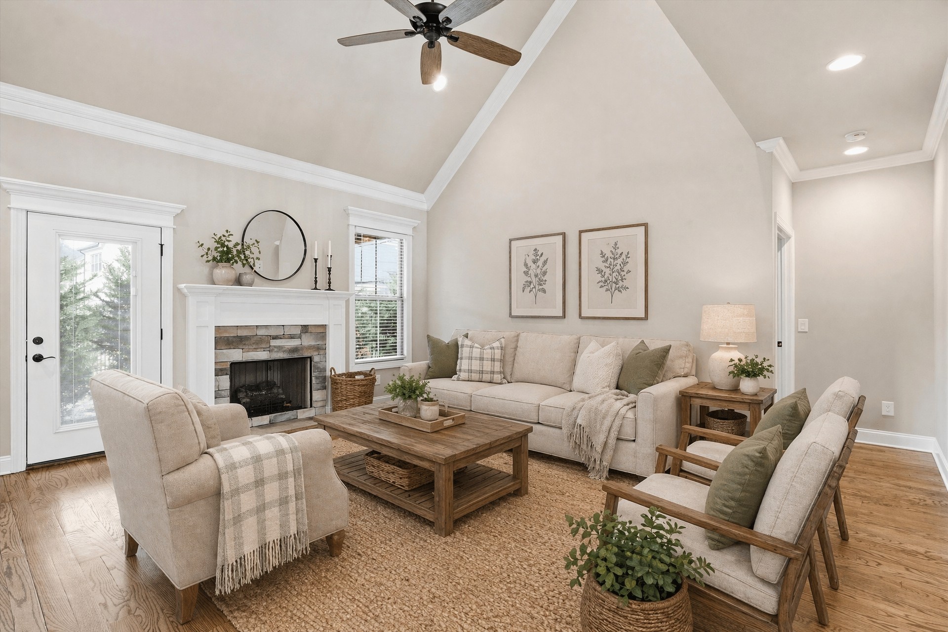 1706 Sorrell Pk Drive Spring Hill, TN 37174 - Photo 10 of 50 a living room with furniture a fireplace and a chandelier