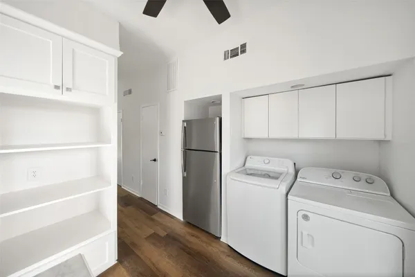 a utility room with dryer and washer
