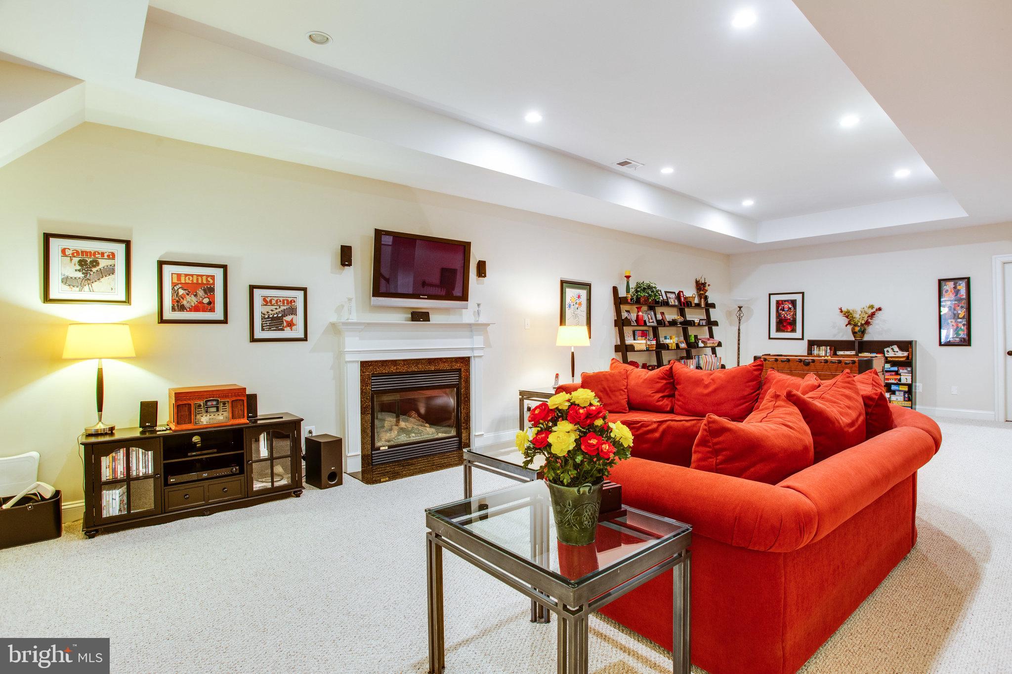 10208 Colvin Run Road Great Falls, VA 22066 - Photo 52 of 67 Cozy up to the gas fireplace
