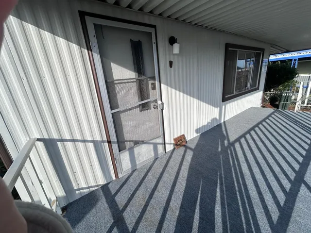 a view of a house with wooden floor