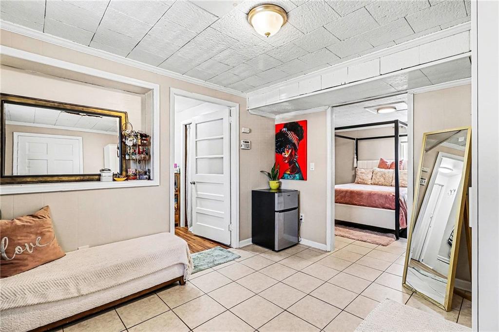 6186 Deans Way Morrow, GA 30260 - Photo 13 of 35 a bedroom with furniture and a window