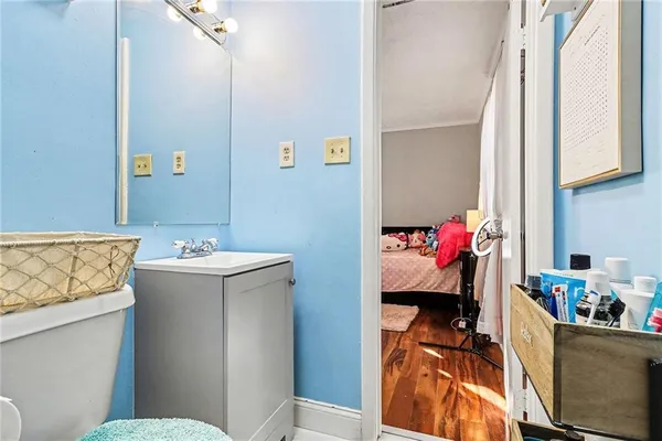 a bathroom with a bathtub sink and toilet