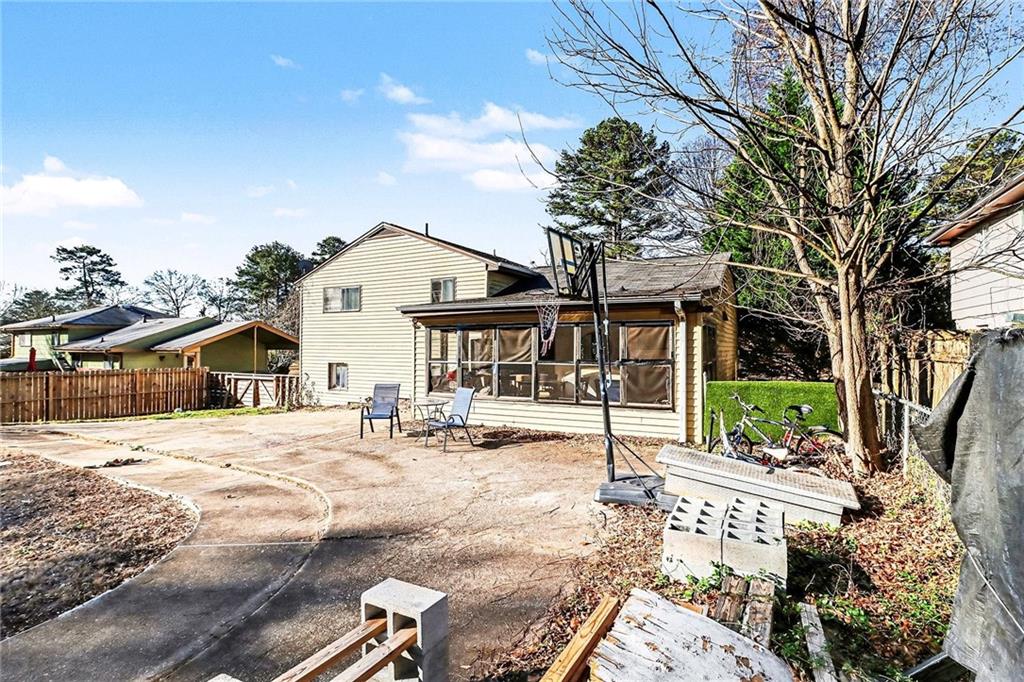 6186 Deans Way Morrow, GA 30260 - Photo 33 of 35 a front view of a house with a tree