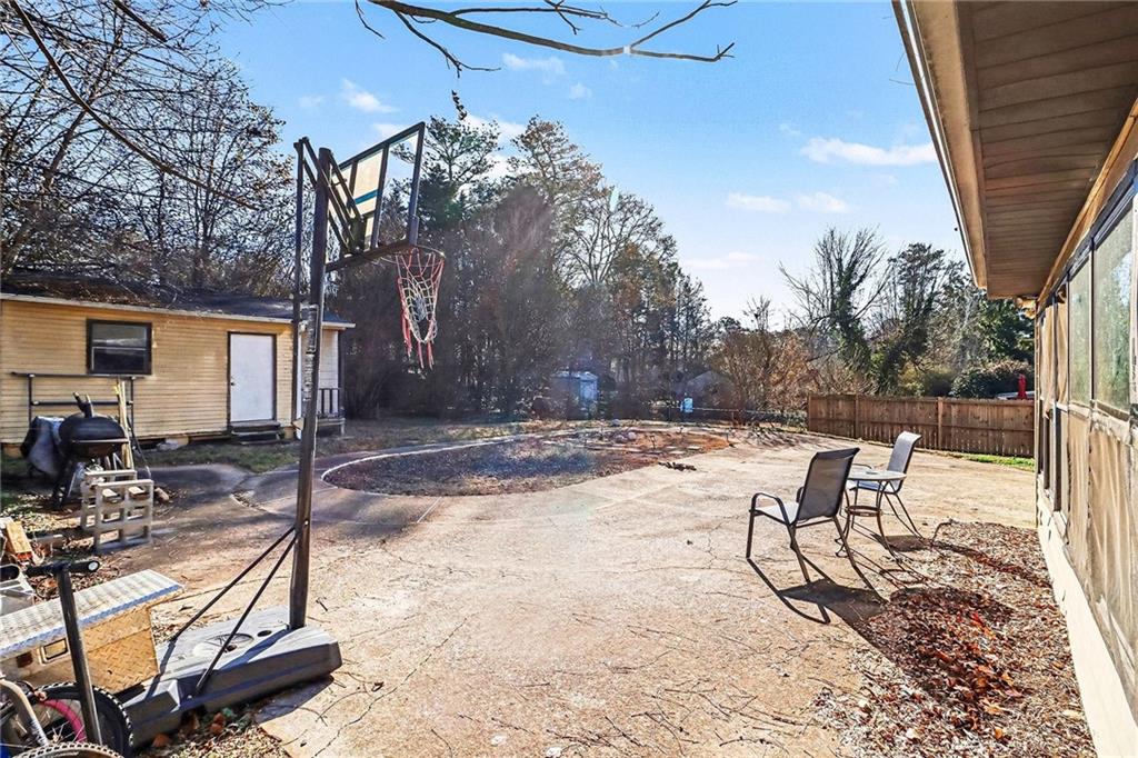 6186 Deans Way Morrow, GA 30260 - Photo 34 of 35 a view of a backyard with sitting area