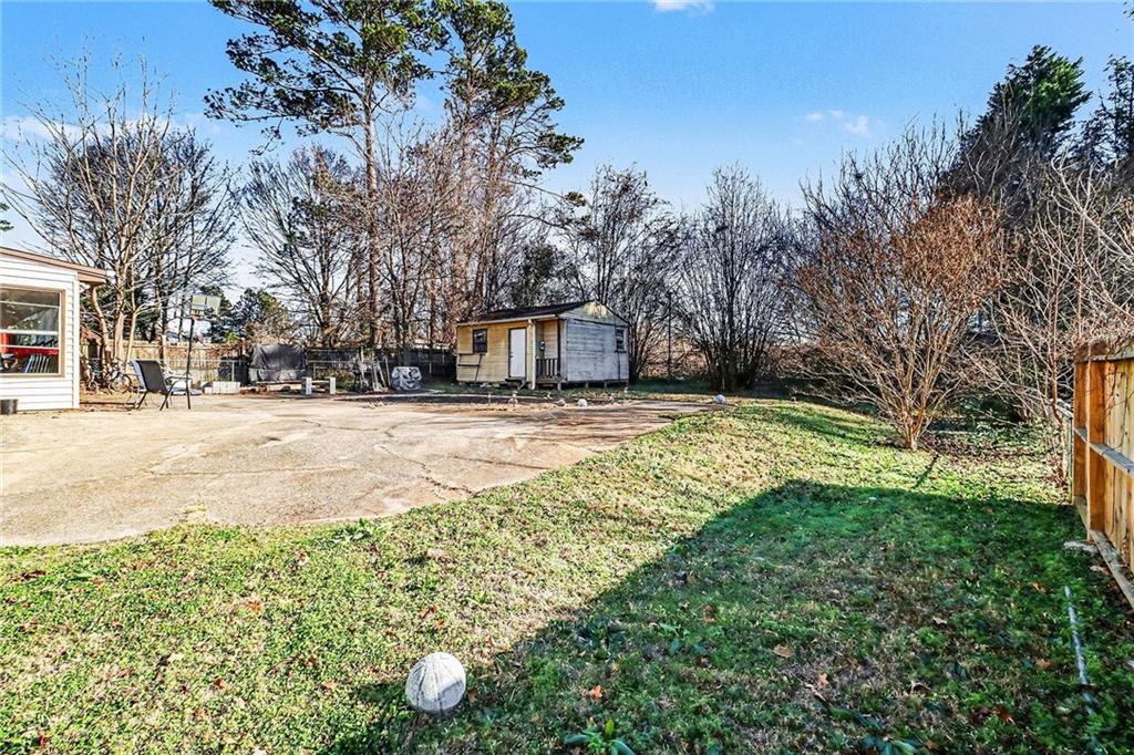 6186 Deans Way Morrow, GA 30260 - Photo 35 of 35 a view of yard with swimming pool and green space
