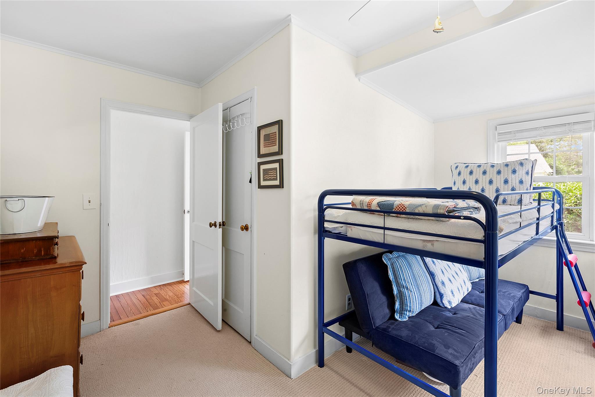 315 Old Salt Road Mattituck, NY 11952 - Photo 16 of 22 a view of a livingroom with furniture and windows