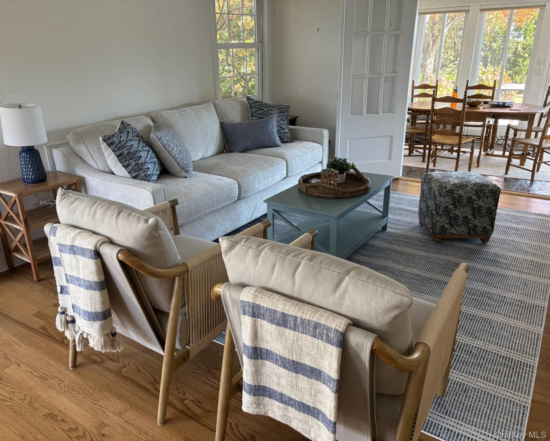 315 Old Salt Road Mattituck, NY 11952 - Photo 9 of 22 a living room with furniture and a large window