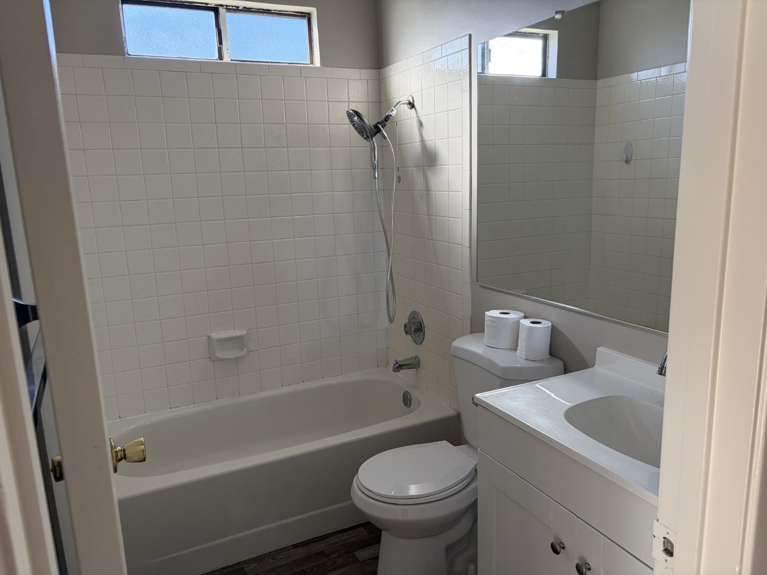 2401 Walnut Grove Way Modesto, CA 95355 - Photo 14 of 25 a bathroom with a sink toilet and shower