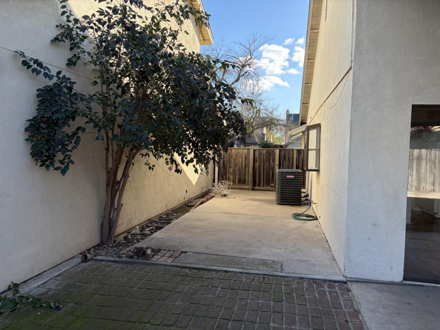 2401 Walnut Grove Way Modesto, CA 95355 - Photo 20 of 25 a backyard of a house with lots of green space