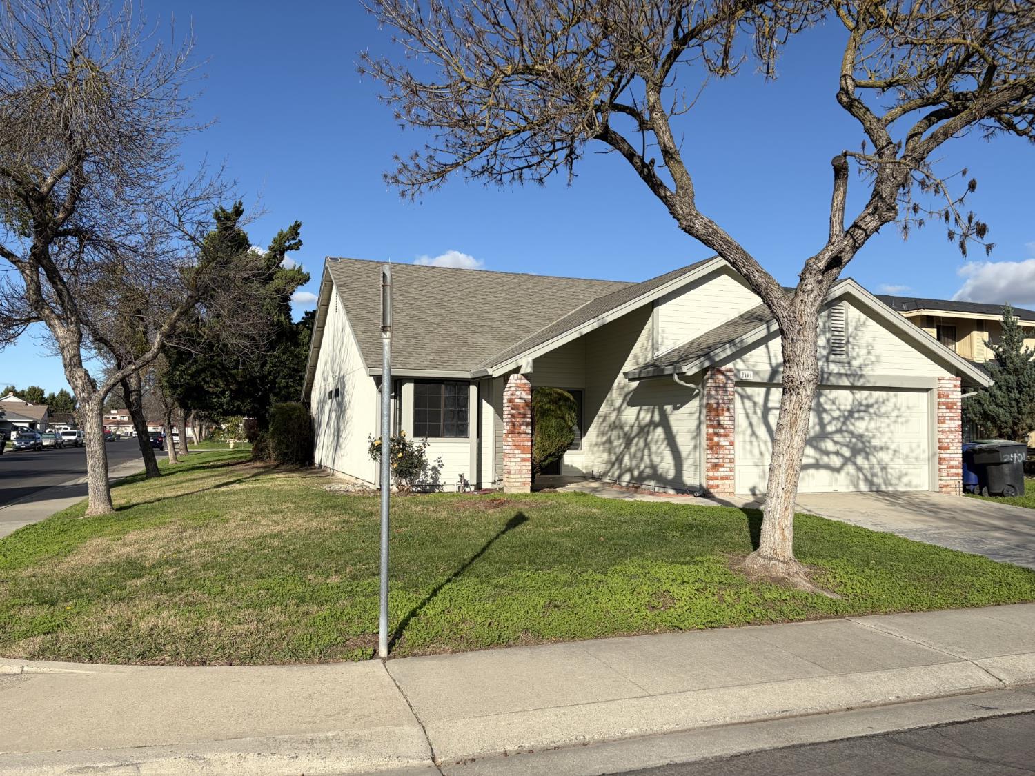 2401 Walnut Grove Way Modesto, CA 95355 - Photo 2 of 25 a view of a house with a yard