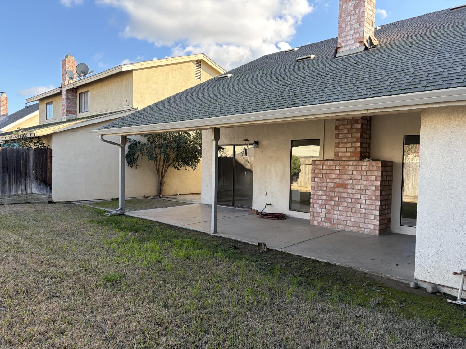 2401 Walnut Grove Way Modesto, CA 95355 - Photo 21 of 25 a view of an house with backyard and balcony