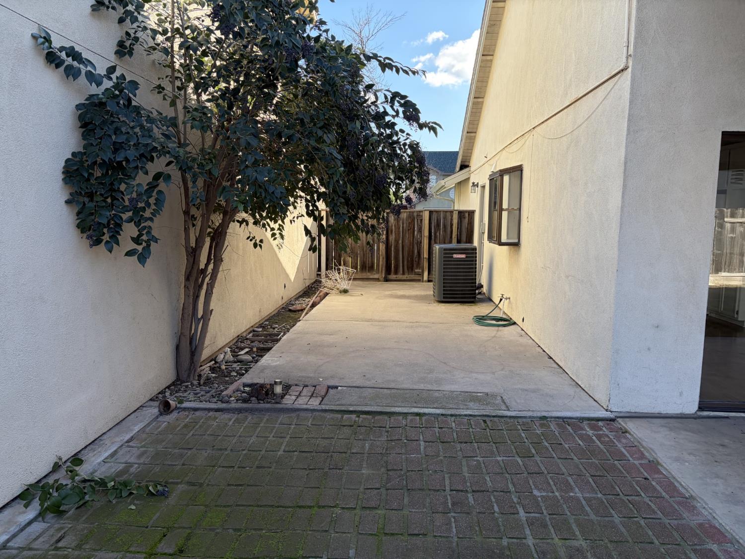 2401 Walnut Grove Way Modesto, CA 95355 - Photo 23 of 25 a view of a pathway with a yard
