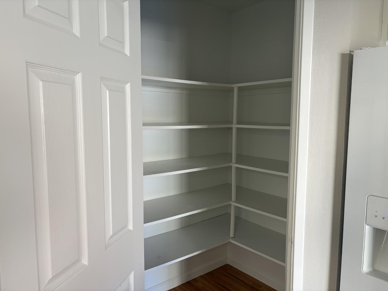 2401 Walnut Grove Way Modesto, CA 95355 - Photo 9 of 25 a view of walk in closet with empty racks